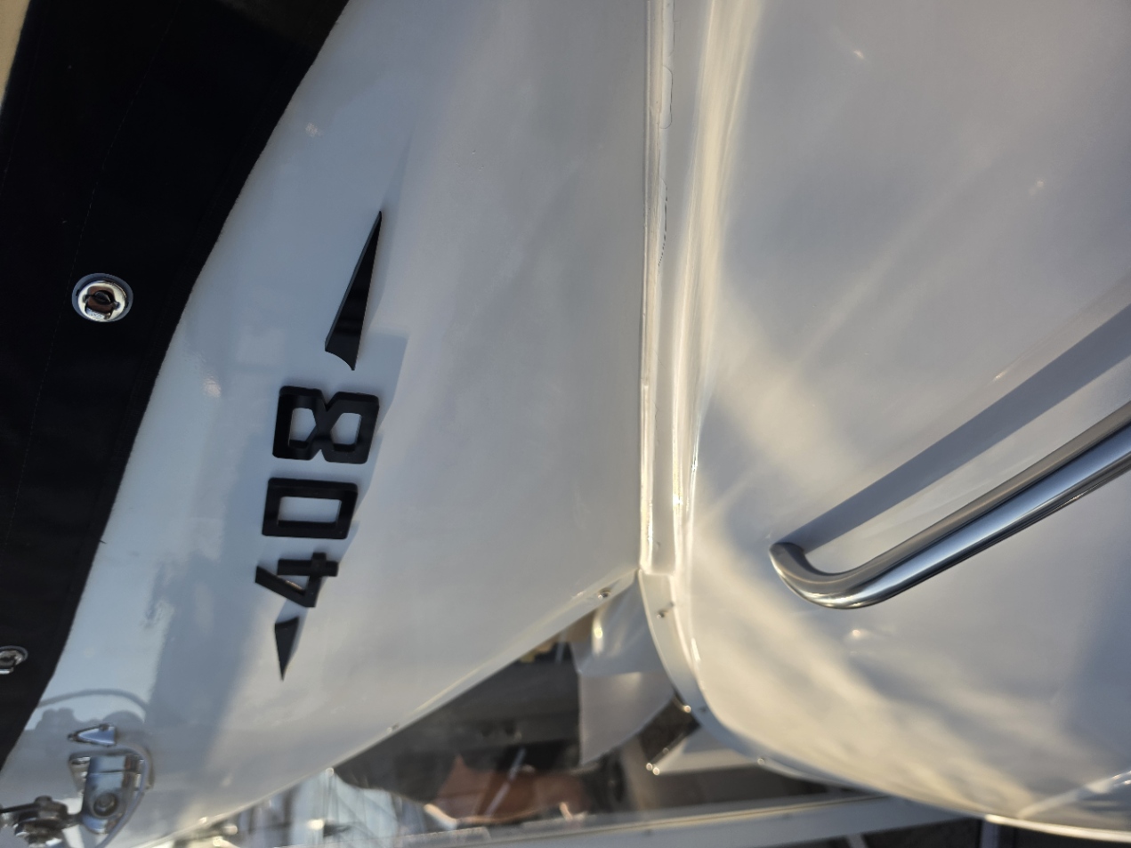 Meridian 408 model badge on Holy Ship's freshly detailed hull